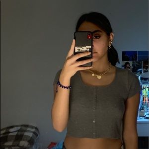 I’m selling a grey buttoned crop top!!